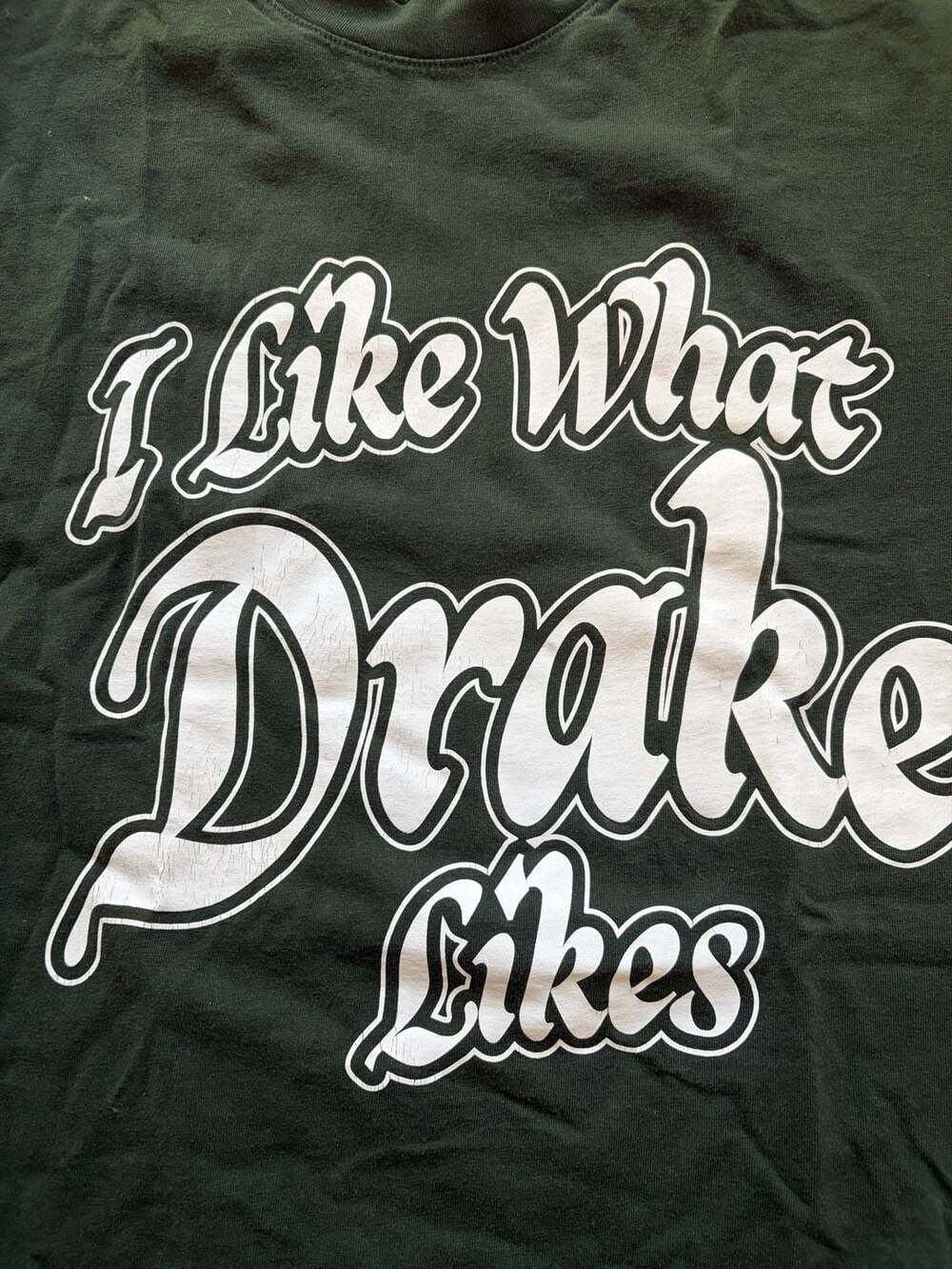 Drake It's All A Blur Tour 'I Like What Drake Likes' Green Graphic T-Shirt
Crack